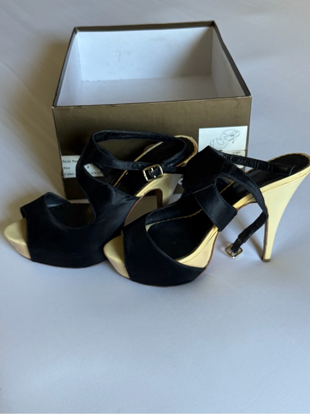 bebe Black and Gold Peep-Toe Platform Heels